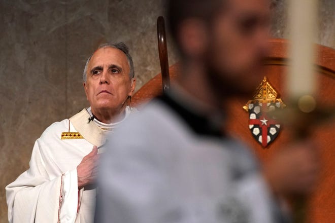 Cardinal Daniel DiNardo presides over a Mass of Ordination for seven candidates for the priesthood at the Co-Cathedral of the Sacred Heart in Houston Saturday, June 1, 2019. DiNardo, leading the U.S. Catholic Church's sex abuse response, has been accused of mishandling a case where his deputy allegedly manipulated a woman into a sexual relationship, even as he counselled her husband and solicited their donations.