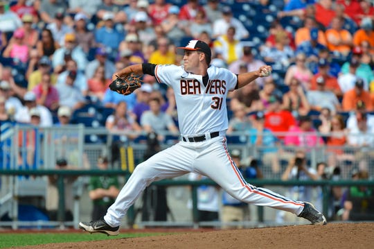 Matt Boyd pitches for Oregon State in the 2013 College World Series.