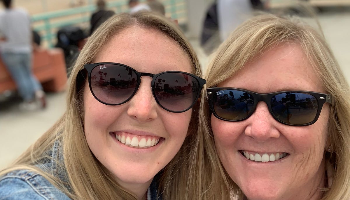 Camille and Ann Andersen pose for selfies on the Manhattan Beach Pier