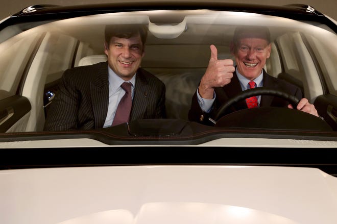 Jim Farley, then-Executive Vice President of Global Marketing, Sales and Service and Lincoln for Ford Motor Company and Alan Mulally, then-CEO, at their Ford Product Development Center in Dearborn on Tuesday Jan. 8, 2013.
