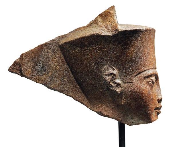This image released by Christie's on Tuesday, June 11, 2019, shows a 3,000-year-old stone sculpture of the famed boy pharaoh Tutankhamun at Christie's in London.