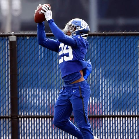 New York Giants' Kamrin Moore makes a catch...