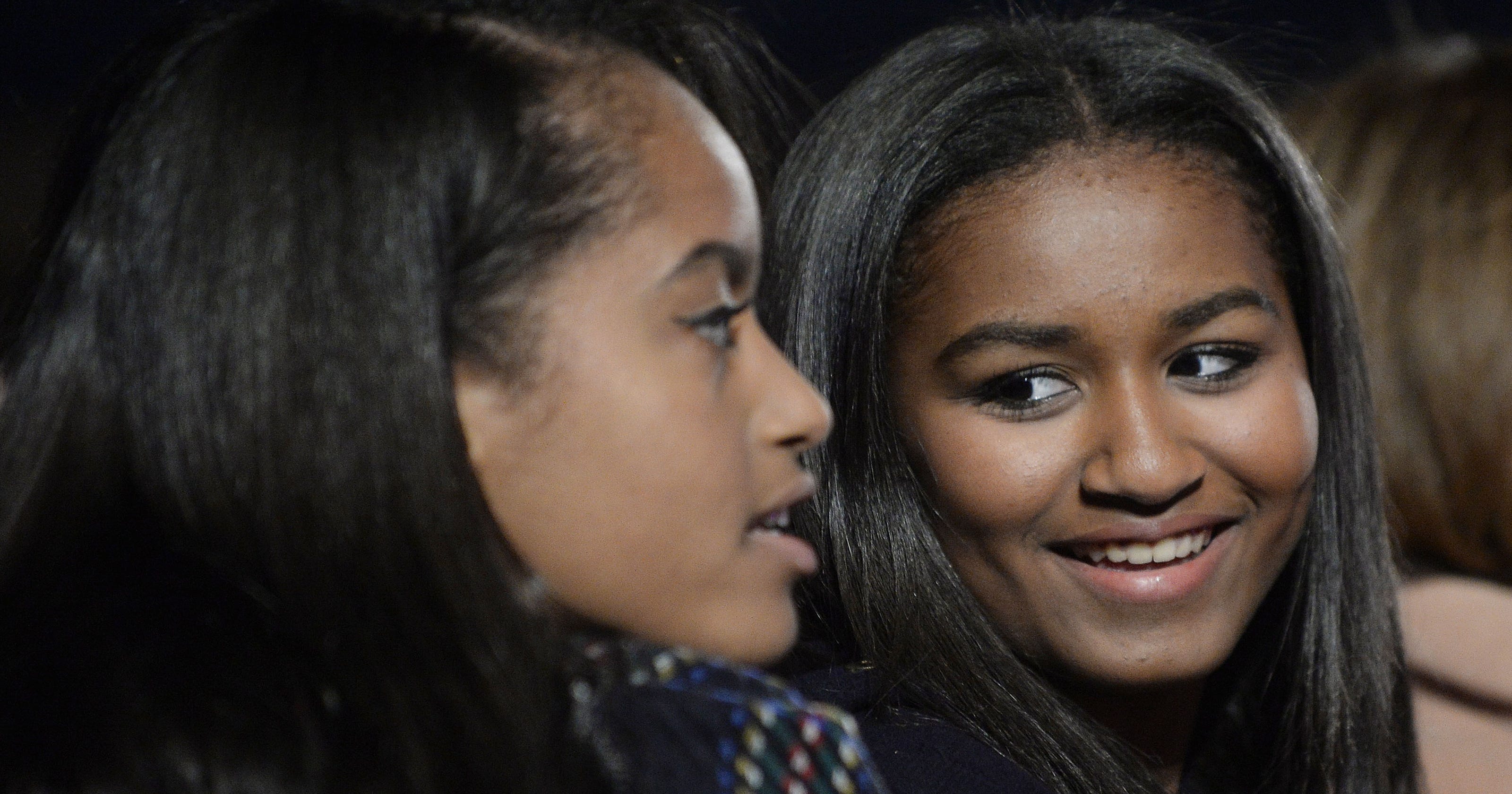 Sasha Obama graduates from high school as presidential parents watch