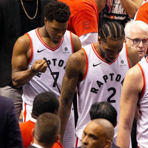 The Raptors leave the floor after losing Game 5.