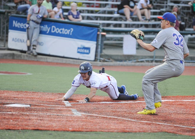 Gavin Homer slides into home in a win over Champion City on June 11, 2019. The Paints defeated the Danville Dans in the East Division Championship Game 3-1 on Thursday.
