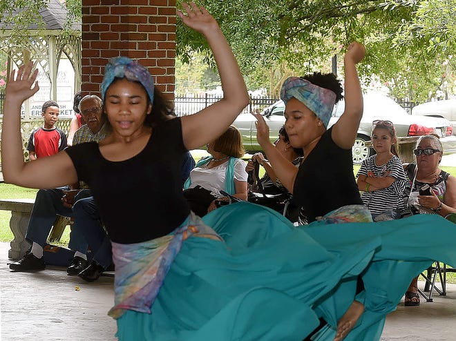 Freddie Herpin, Daily World
Dance students from P.J.s Dance Art School perform a traditional dance, much to the delight of the crowd attending the annual Juneteenth Folklife Celebration held Saturday at the Farmers Market in Opelousas. The event is sponsored by Rebecca Henry and Creole Heritage, Inc.