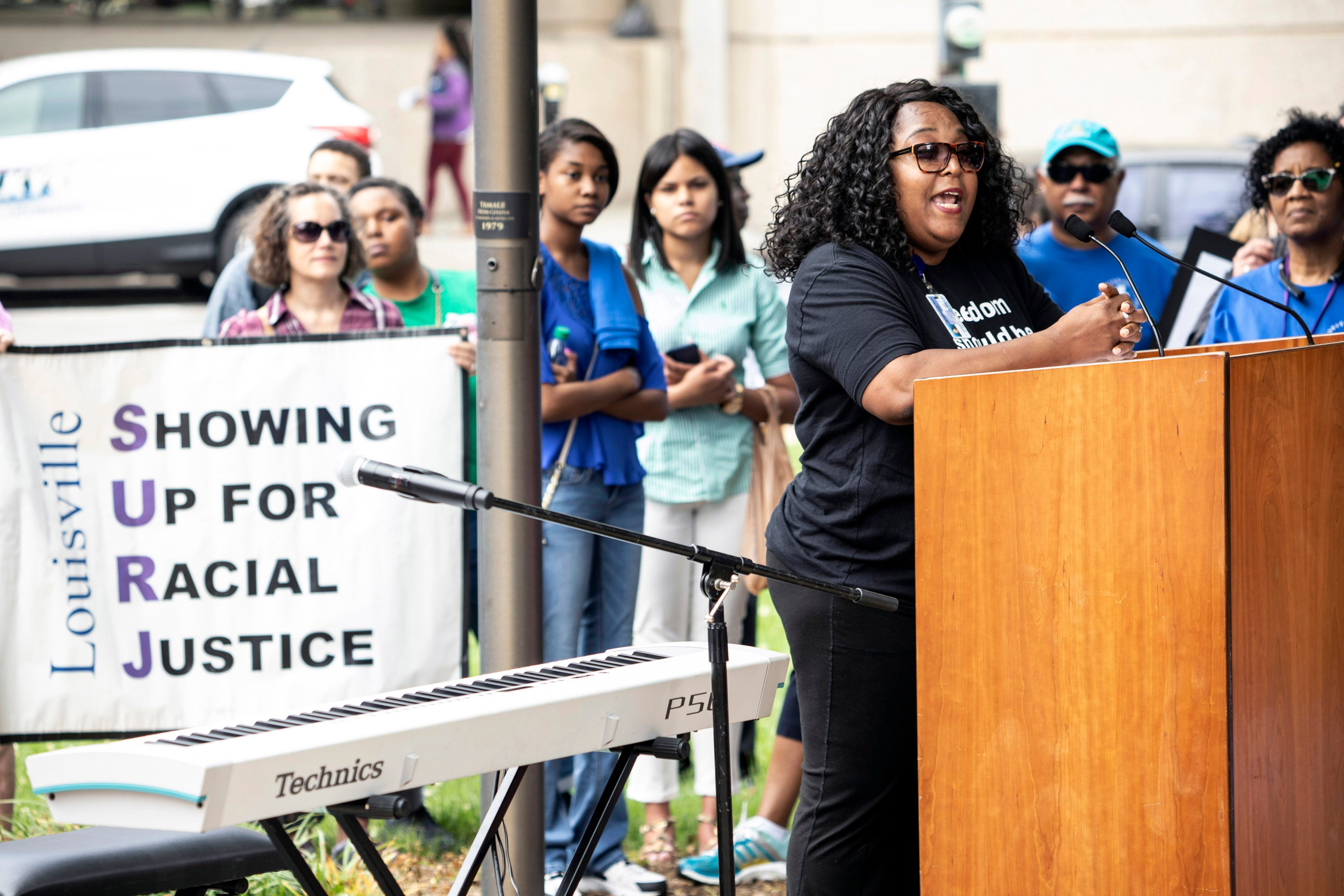 Bail Project site manager Shameka Parrish-Wright spoke to a crowd of supporters during a rally in Jefferson Square on Wednesday. 
June 12, 2019