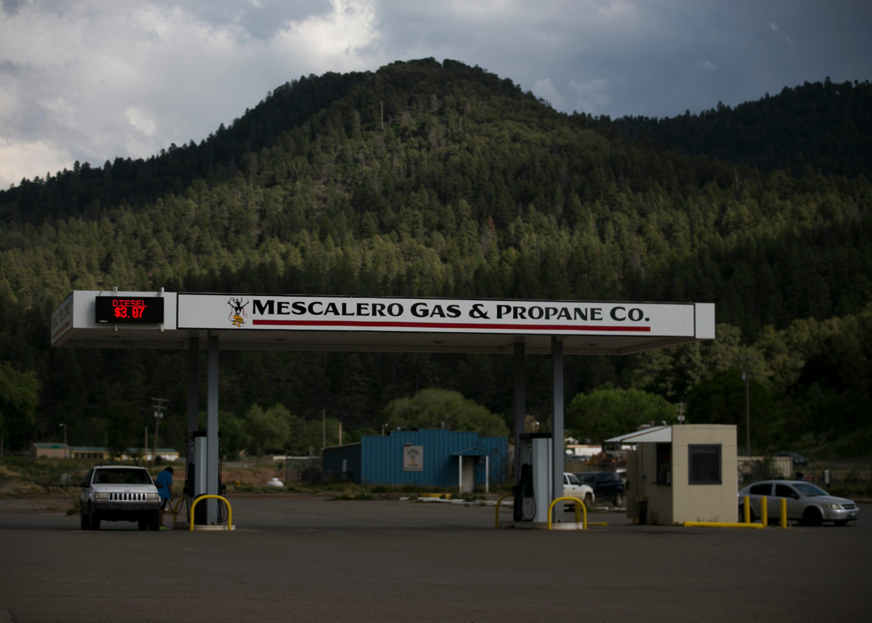 Clouds roll over the ridges of hills in Mescalero, New Mexico, on May 30, 2019.