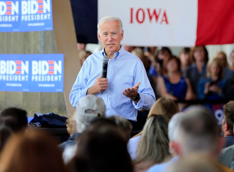 Former Vice President Joe Biden campaigns in a packed hall in Ottumwa, Iowa, on June 11.