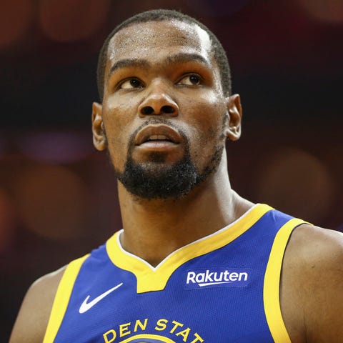 Golden State Warriors forward Kevin Durant looks...