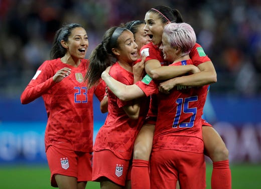 United States' Alex Morgan, second right, celebrates after scoring her side's 12th goal during the Women's World Cup Group F soccer match between United States and Thailand at the Stade Auguste-Delaune in Reims, France, Tuesday, June 11, 2019. Morgan scored five goals during the match. (AP Photo/Alessandra Tarantino) ORG XMIT: RSOB167