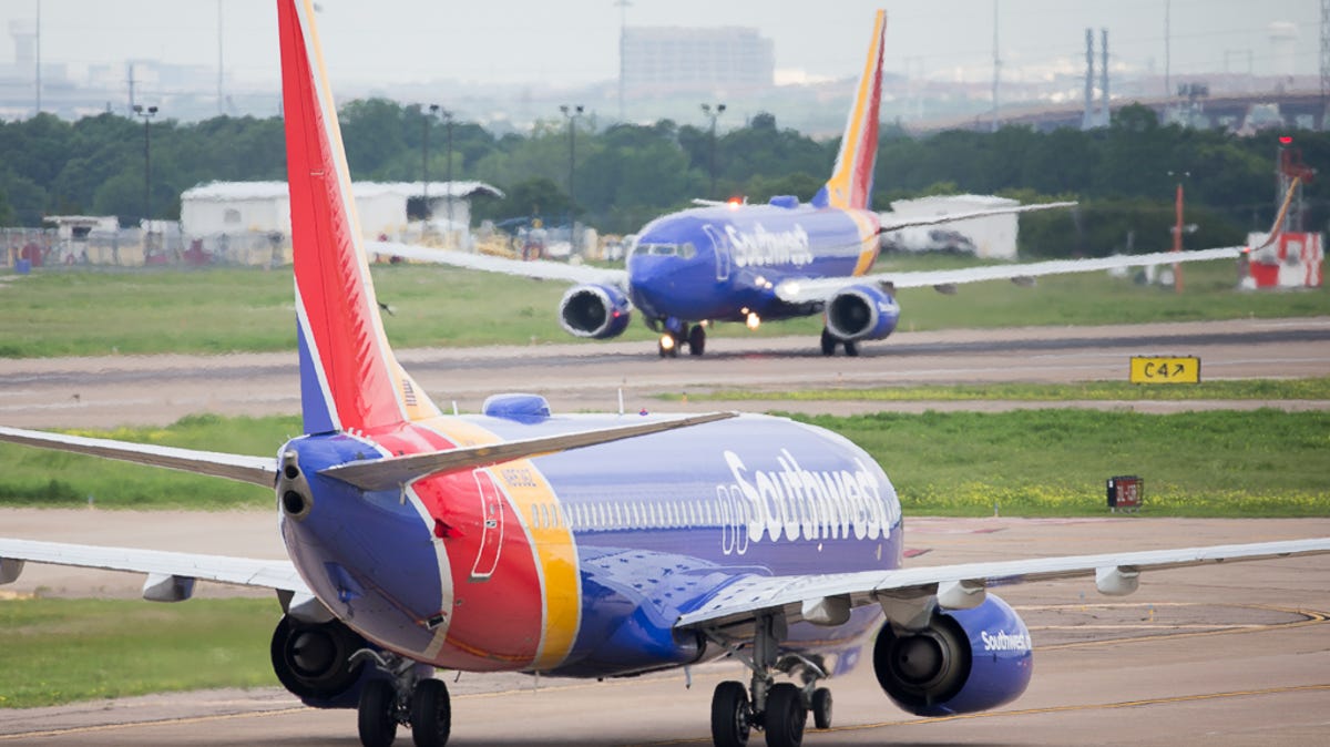 To paraphrase "The Lion King," it's the circle of airport life, as one Southwest Airlines Boeing 737 taxis as another lands at Dallas Love Field. Click forward as the airline and photographer Jeremy Dwyer-Lindgren show you a day in the life of Southwest crew members at the historic Texas airport.