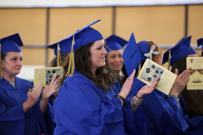 Christina Flesner received her certificate in entrepreneurship at Mission Creek Corrections Center in Belfair on Wednesday. Flesner didn't graduate from high school, but she earned her GED and the certificate while incarcerated.