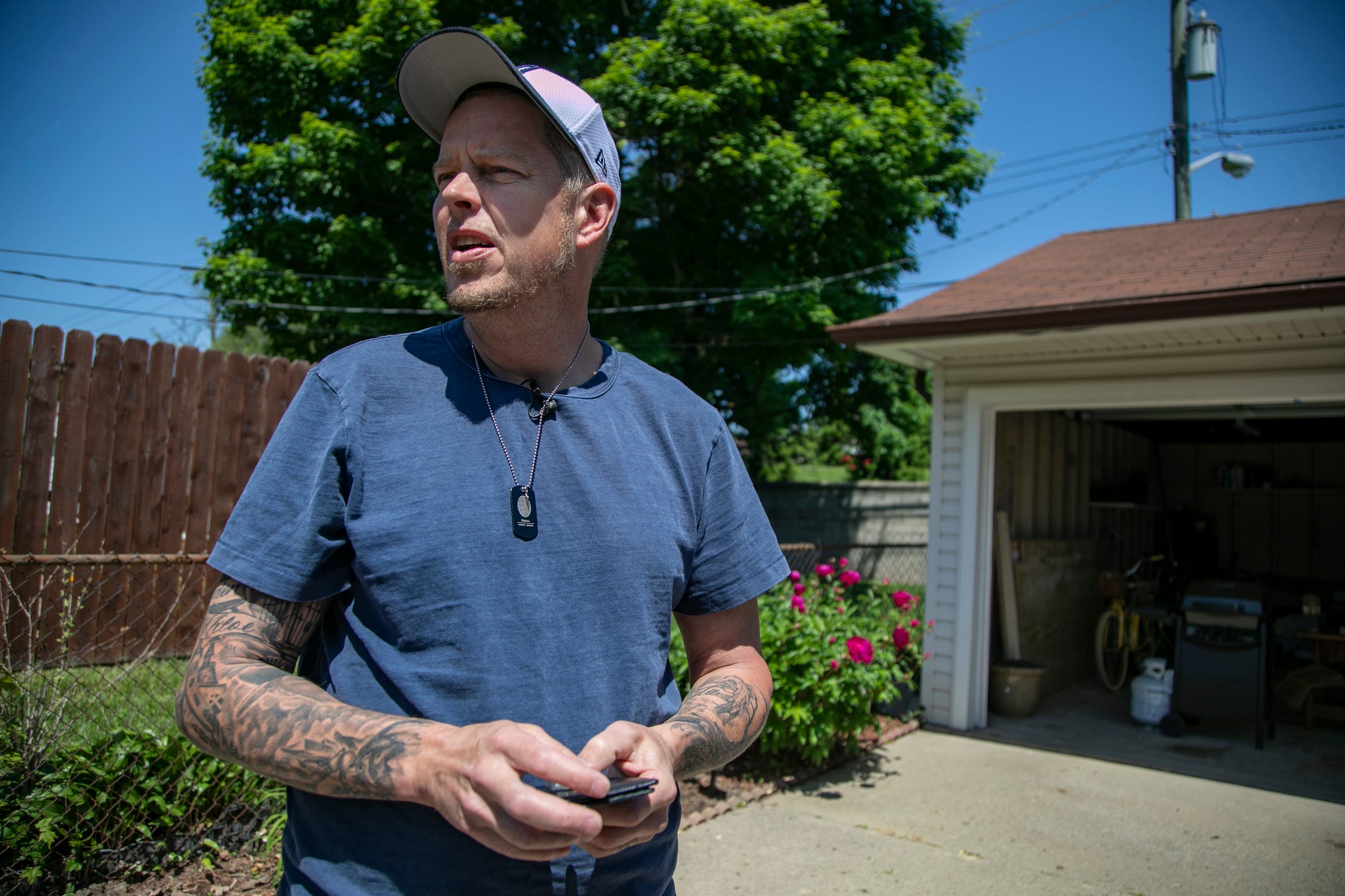 Andy Hopson, 51, of Livonia is a recovering addict who lost his son, Dakota, on May, 5, 2016, to a heroin overdose. He looks out as he describes the wallet he keeps in his truck that belonged to his son.
