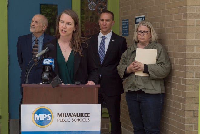 Milwaukee Public Schools board member Megan O'Halloran criticizes Republican lawmakers' proposed education budget at a news conference Thursday.  Also taking part were, from left, MPS Board President Larry Miller, Sen. Chris Larson, D-Milwaukee, and Milwaukee Teachers Education Association President Amy Mizialko.