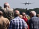 epa07645513 Plane spotters watch a landing DC-3 heritage plane during a spotter day at the German Air Force's airfield in Jagel, northern Germany, 13 June 2019. On the occasion of the 70th anniversary of the Berlin Airlift, about a dozen of former 'Raisin Bombers' (Rosinenbomber) planes met in Jagel. From 1948 to 1949, during the Berlin blockade, planes of the Western Allied Forces carried food and fuel from Western Germany to Berlin. EPA-EFE/FOCKE STRANGMANN