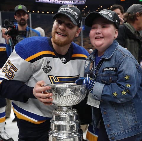 Colton Parayko and Laila Anderson celebrate with...