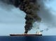 TOPSHOT - A picture obtained by AFP from Iranian State TV IRIB on June 13, 2019 reportedly shows smoke billowing from a tanker said to have been attacked off the coast of Oman, at un undisclosed location. - The crews of two oil tankers were evacuated off the coast of Iran today after they were reportedly attacked and caught fire in the Gulf of Oman, sending world oil prices soaring. The mystery incident, the second involving shipping in the strategic sea lane in only a few weeks, came amid spiralling tensions between Tehran and Washington, which has pointed the finger at Iran over tanker attacks in May. Iran said its navy had rescued 44 crew members after the two vessels caught fire in "accidents" off its coast. (Photo by HO / IRIB TV / AFP) / == RESTRICTED TO EDITORIAL USE - MANDATORY CREDIT "AFP PHOTO / HO / IRIB" - NO MARKETING NO ADVERTISING CAMPAIGNS - DISTRIBUTED AS A SERVICE TO CLIENTS FROM ALTERNATIVE SOURCES, AFP IS NOT RESPONSIBLE FOR ANY DIGITAL ALTERATIONS TO THE PICTURE'S EDITORIAL CONTENT, DATE AND LOCATION WHICH CANNOT BE INDEPENDENTLY VERIFIED - NO RESALE -NO ACCESS lSRAEL MEDIA -PERSIAN LANGUAGE TV STATIONS OUTSIDE IRAN - STRICTLY NO ACCESS BBC PERSIAN == / HO/AFP/Getty Images ORIG FILE ID: AFP_1HH1VD