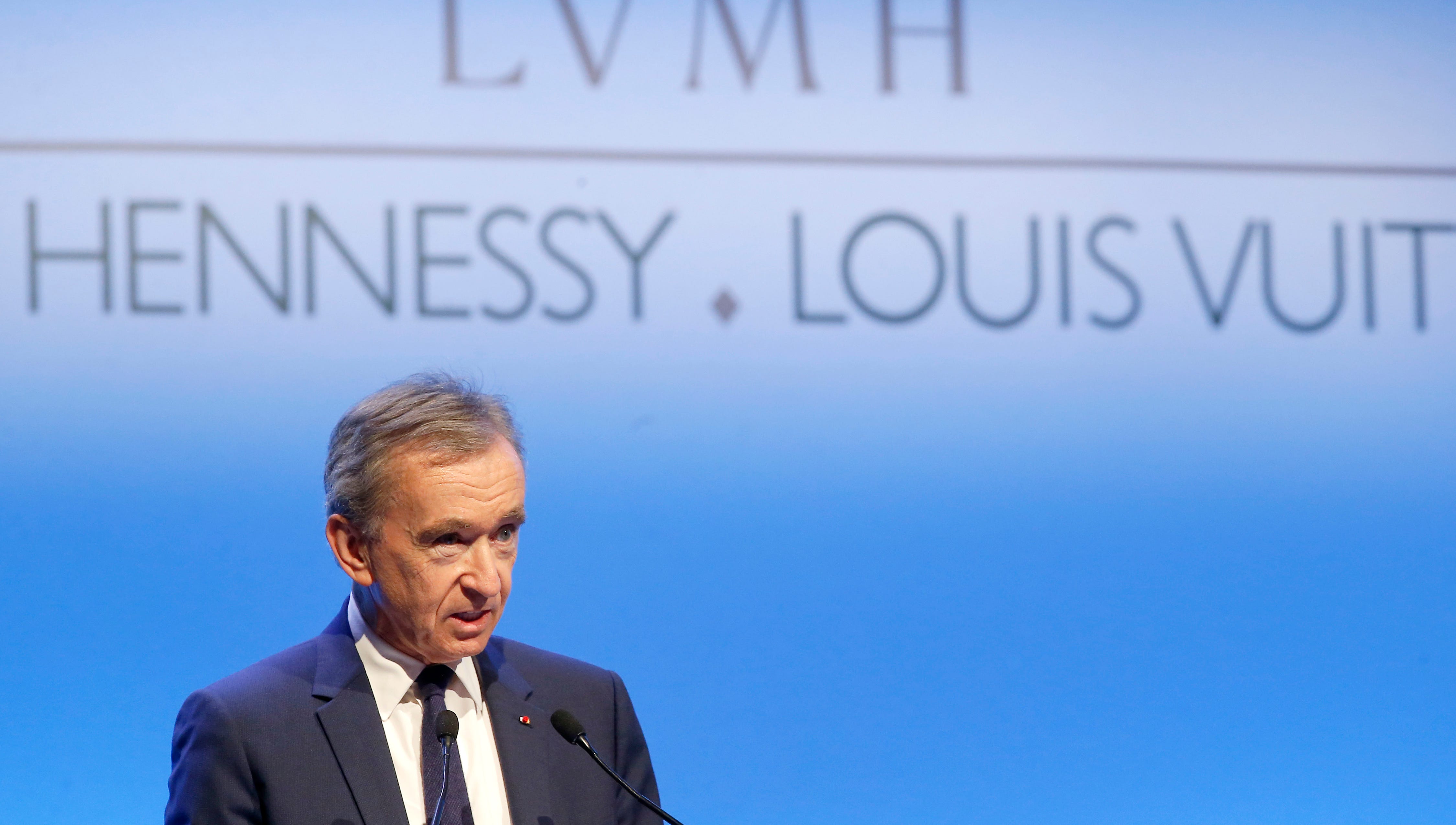 FILE - In this Jan.25, 2018 file photo, CEO of LVMH Bernard Arnault presents the group's 2017 results in Paris, France. The billionaire French donors including Bernard Arnault, CEO of luxury giant LVMH that owns Louis Vuitton and Dior, publicly promised flashy donations, but it's mainly American citizens that have footed the bills and paid salaries for the up to 150 workers employed by the cathedral since the April 15 fire. (AP Photos/Michel Euler, File)