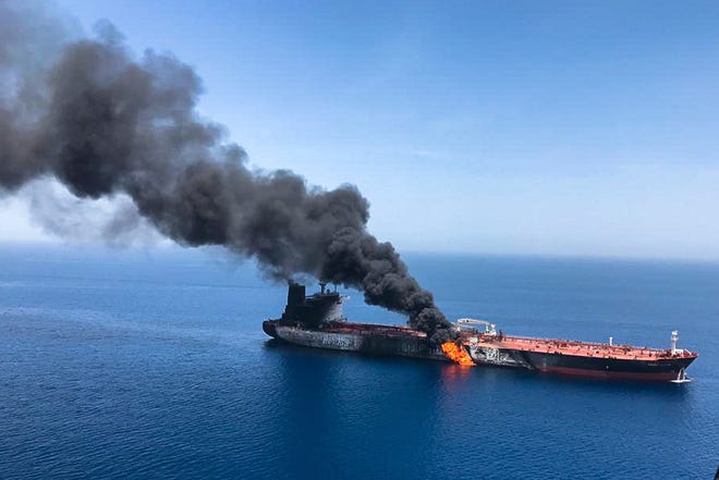 An oil tanker is on fire in the sea of Oman, on Thursday.