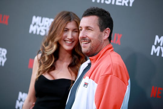 (Gd) Jackie Sandler and Adam Sandler attend the premiere of Netflix's Murder Mystery.