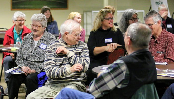 Participants enjoy a laugh last Wednesday during the Wisconsin Historical Society's "Share Your Voice" listening session for its planned new Wisconsin history museum, held at the Marathon County Historical Society's Woodson Center. The day before the event, one of dozens being held across Wisconsin, the state Legislature's Joint Committee on Finance included $70 million in the 2019-21 capital budget for the new museum, which will be located on the Capitol Square in Madison and replace the current Wisconsin Historical Museum.