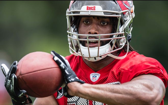 York Catholic graduate Hakeem Kinard practices with the Tampa Bay Buccaneers during the team's rookie minicamp in May.