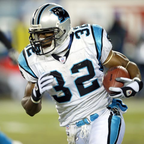 Panthers running back Rod Smart rushes against...