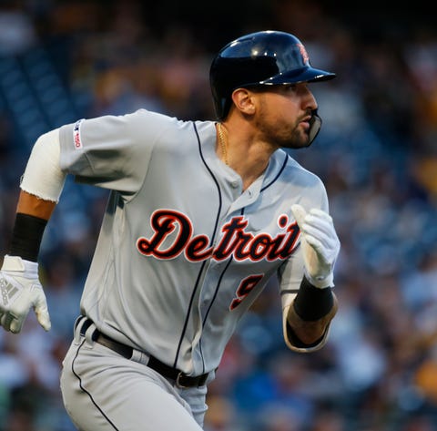 Tigers right fielder Nicholas Castellanos hits an...