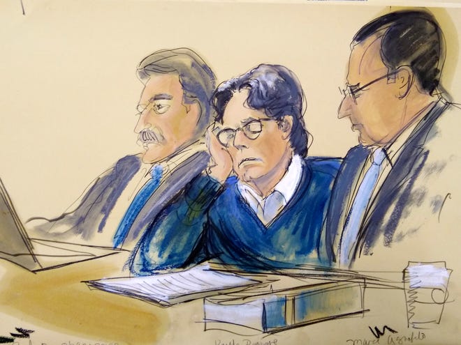 In this courtroom artist's sketch, defendant Keith Raniere, center, sits with attorneys Paul DerOhannesian, left, and Marc Agnifilo during closing arguments at Brooklyn federal court, Tuesday, June 18, 2019 in New York.
