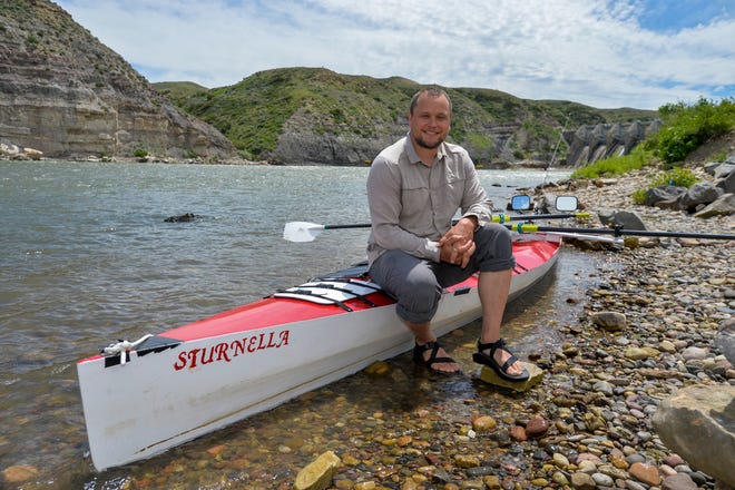 Mark Juras sits on his custom built sculling row boat, the Sturnella, below Morony Dam June 19, 2019.  He intends to travel the length of the Missouri River with the goal of reaching the Mississippi River and ultimately the Gulf of Mexico.  He started his journey at the headwaters of the Missouri near Three Forks, Montana on June 8th, and hopes to row an average of 40 miles per day, calculating his total journey will take three months.