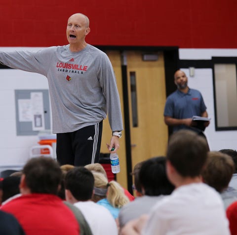 Louisville head basketball coach Chris Mack makes...