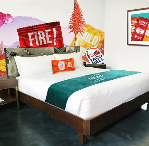 A rendering of Taco Bell-themed king room decor...