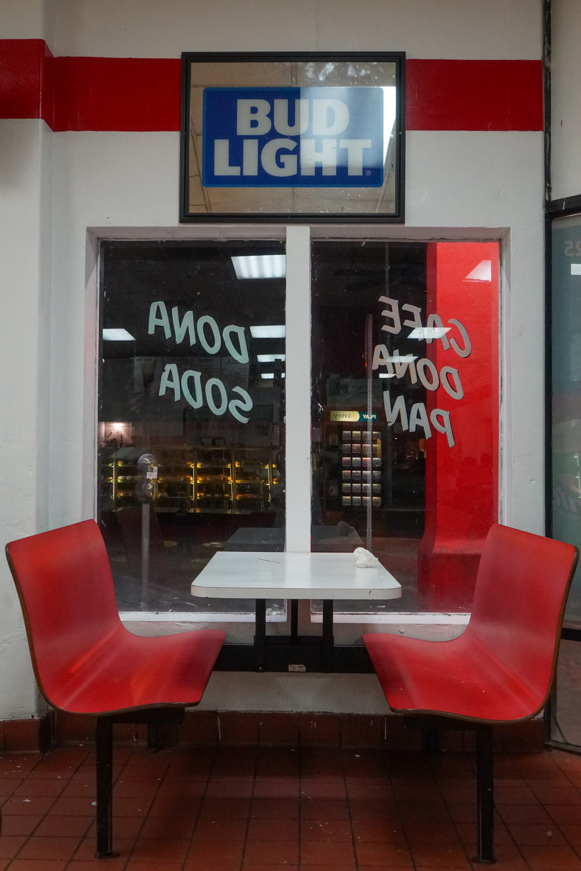 Just before midnight is one of the quietest hours at Donut Avenue, Calexico, Calif., 11:23 PM, June 11, 2019.