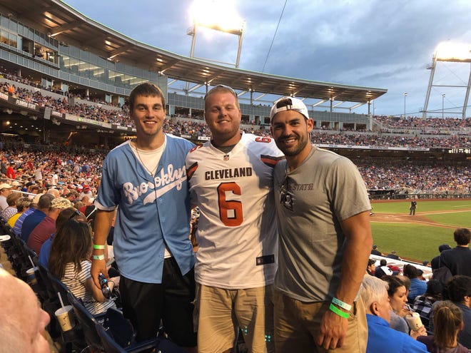 (left to right) Austin Buysse, Zach Nuy and Tyson Sonnenburg decided to take a spontaneous trip to watch the College World Series in Omaha, Nebraska on Monday. Buysse caught a home run ball that was caught on camera and has gone viral.