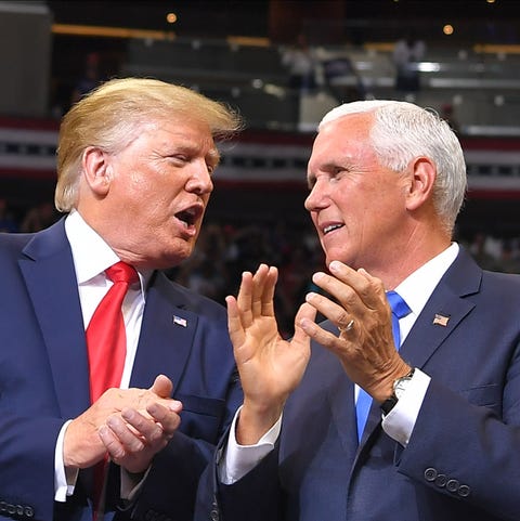 Vice President Mike Pence speaks with President...