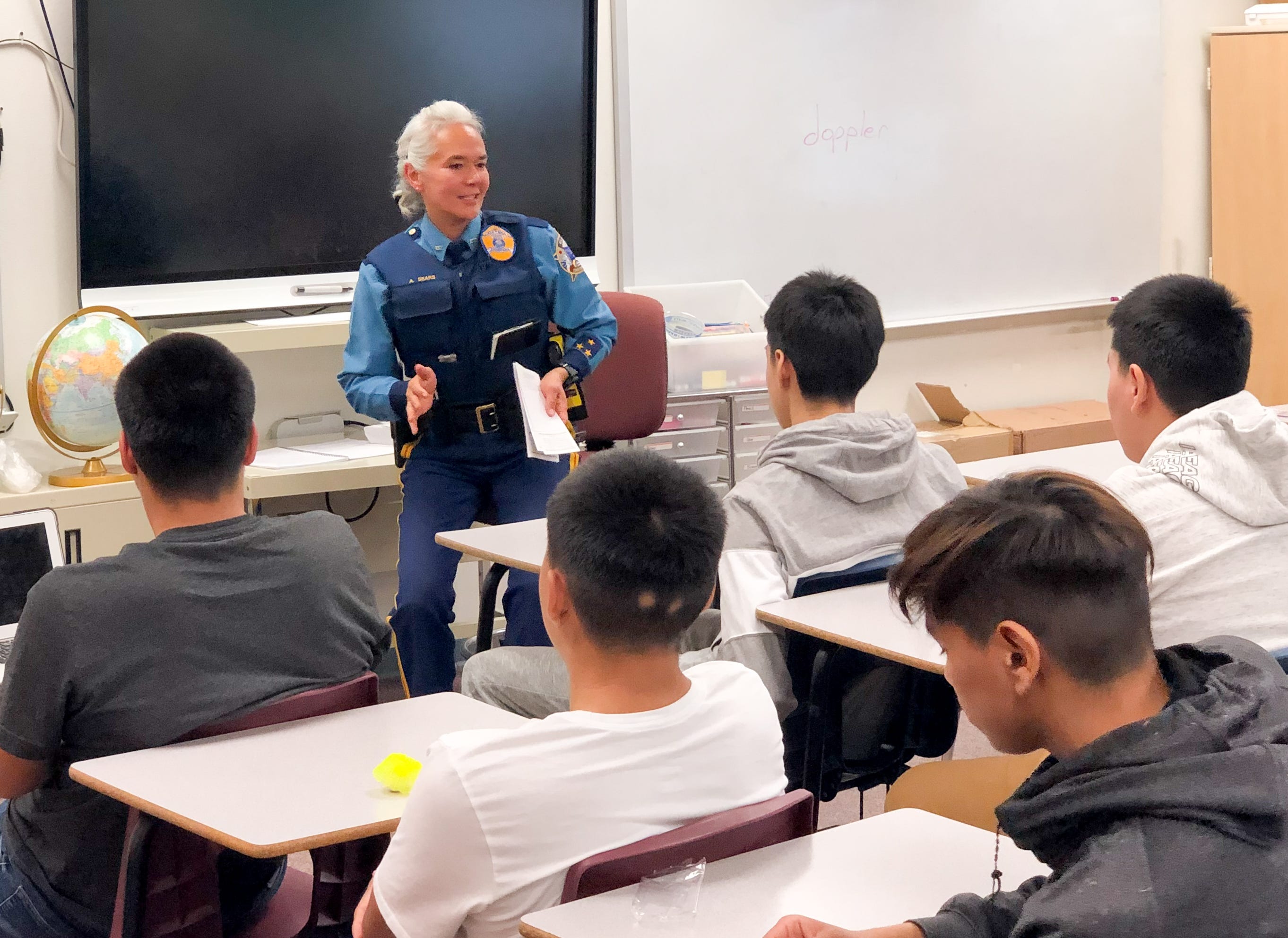 Alaska State Trooper Anne Sears speaks to a classroom of high school students about domestic violence and sexual abuse in Buckland, an Alaska Native community 90 miles south of Kotzebue.