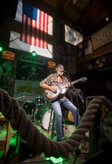 Tony Brook, of Waverly, Ala., performs at the Flora-Bama Lounge in Perdido Key, Fla., on Wednesday, June 19, 2019.