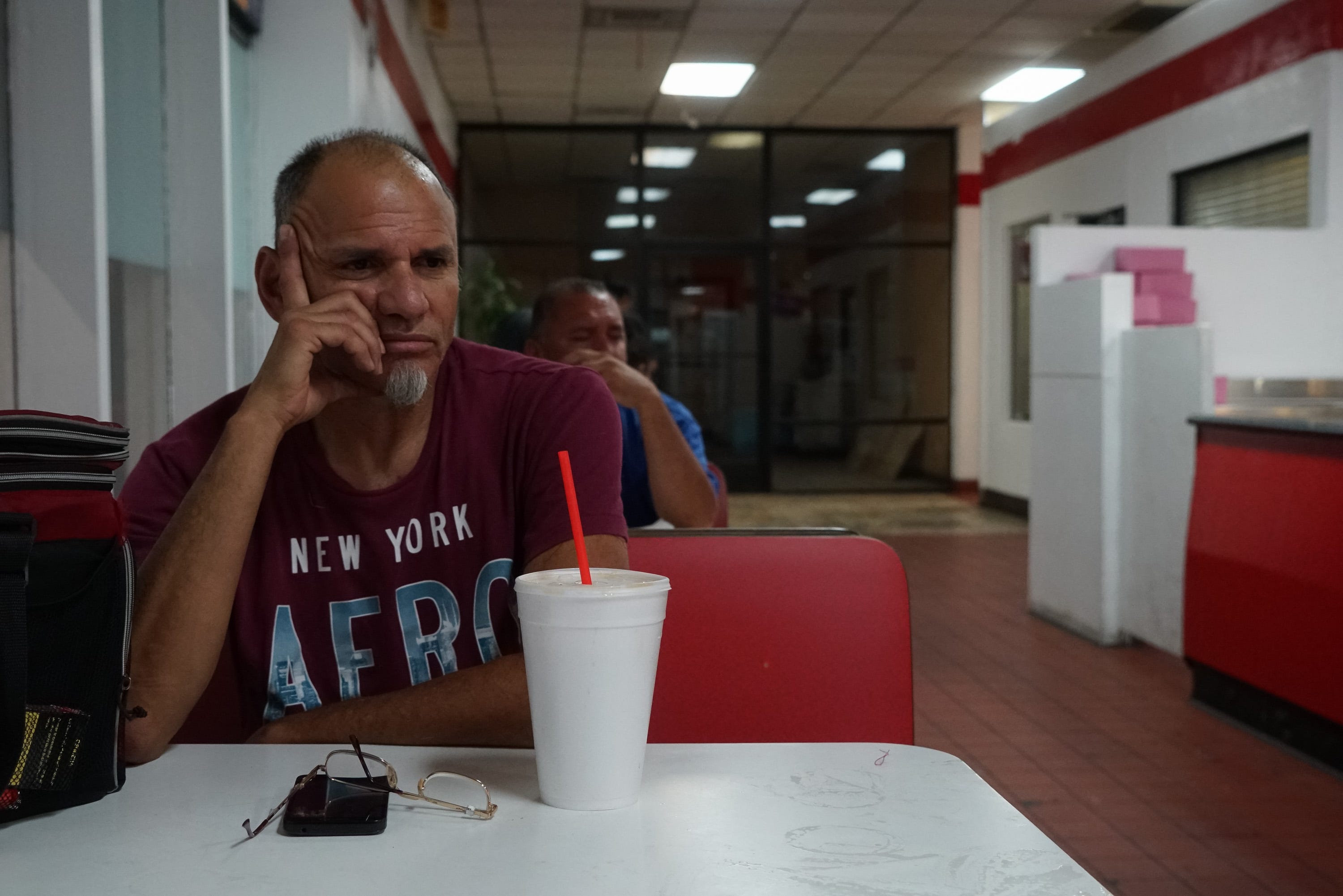 Fernando Bastidas waits at Donut Avenue before heading to his overnight shift at the Spreckels Plant in Brawley, Calexico, Calif., 11:00 PM,  June 11, 2019.