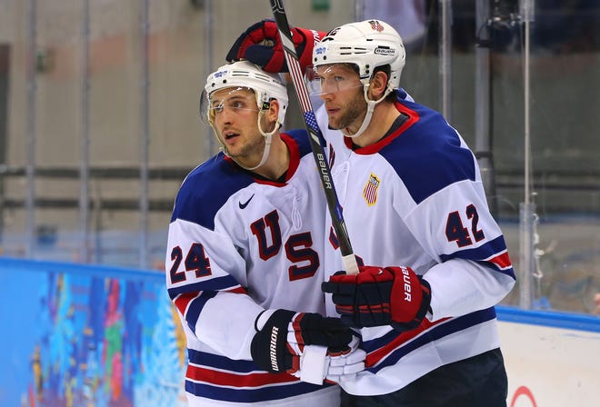 Ryan Callahan, left, celebrates with David Backes after Backes scored during an Olympic win over Slovenia on Feb. 16, 2014,  in Sochi, Russia.