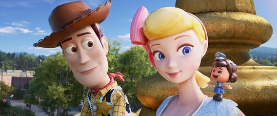 Woody (left, voiced by Tom Hanks) rekindles his relationship with Bo Peep (Annie Potts) and meets her best friend Giggle McDimples (Ally Maki) in "Toy Story 4."