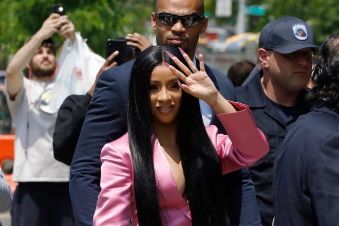 Cardi B arriving at Queens Criminal Court, in New York. The Grammy-winning rapper has been indicted on new felony charges in connection with a fight at a New York City strip club.
