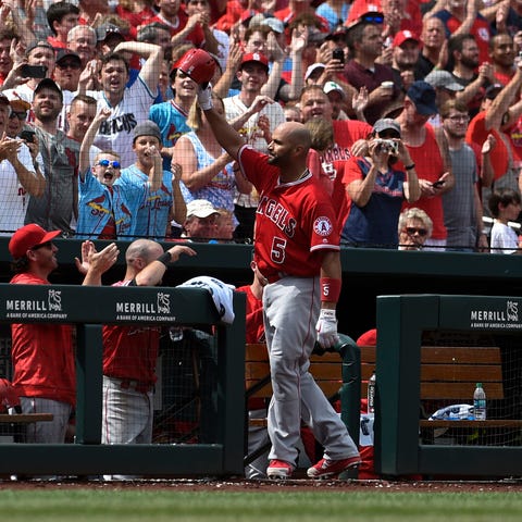 The Angels' Albert Pujols acknowledges the St....