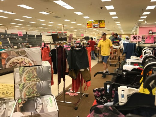 Shoppers at Fond du Lac's Shopko race for deals on the store's final day, June 23, 2019.