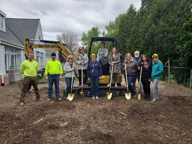 A team of teachers, contractors, staff and project designers broke ground for a new custom-designed curriculum-based playground at Menomonee Falls Children's Community Center at N88 W17550 Christman Road May 20. Pictured are (from left) Tony Mau, owner of LR Contracts;  Darren Keskey of Darren's Skid Steer Service; Shannon Gagnon; Angela Sincere; CCC assistant director Becky Gaynor; Stephanie Abt; CCC director Emily Diener; Amy Hearley; architect Gerry Slater; Kendel Thiesenhusen and Laurie McCormick. Not pictured: Derrick Riemer of Stemper Fi Carpentry.