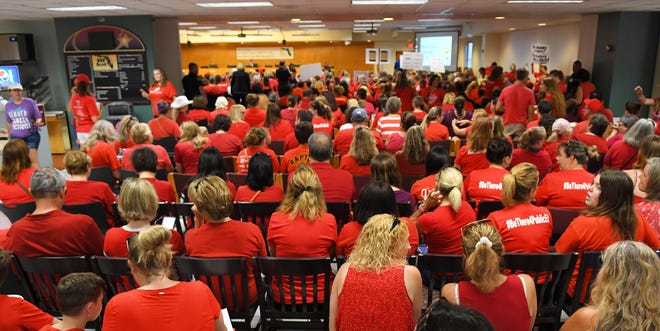 An estimated 900 teachers and their supporters rallied outside and eventually filled the school board meeting room in Viera on Monday. They were fighting for a better raise than was proposed by superintendent Mark Mullins. After hearing both sides of the issues, the school board members eventually voted 4-1 to back the Mullins plan over the teacher's union plan that an impartial magistrate endorsed.