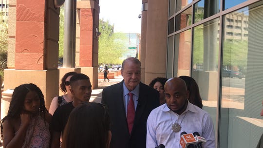 From left to right: Iesha Harper, Dravon Ames, Tom Horne and Jarrett Maupin speak to reporters about their request for city documents outside Phoenix City Hall on June 24, 2019.