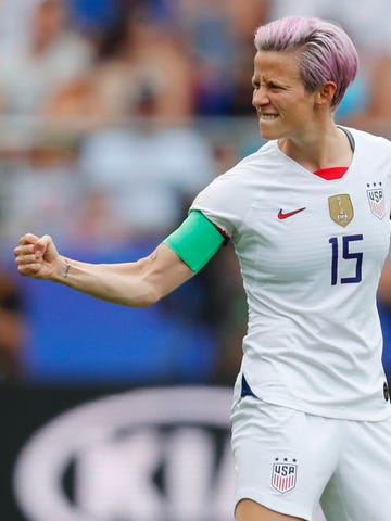 June 24: United States forward Megan Rapinoe celebrates after scoring a penalty kick goal during the first half against Spain.