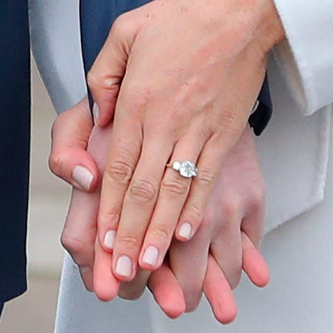 The original engagement ring with a gold band,...