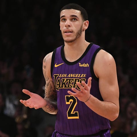 Ex-Los Angeles Lakers guard Lonzo Ball (2) reacts...
